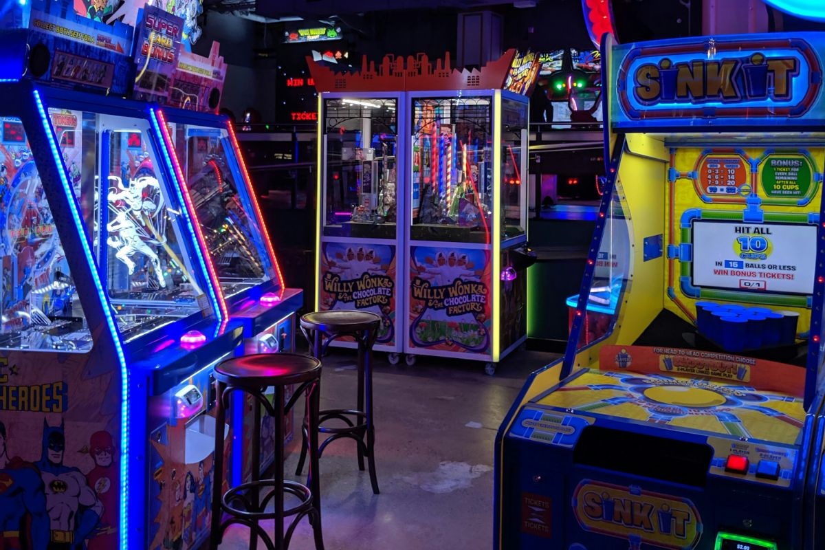 Arcade game room with crane and redemption games